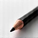 Stylized icon representing artistic precision or excellence